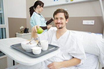 patient having lunch on bed