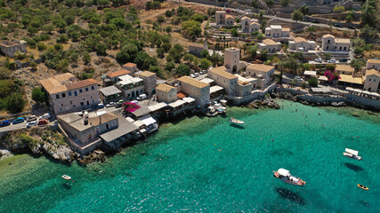 Fototapeta na wymiar Aerial drone photo of beautiful small seaside village of Limeni with emerald clear sea, Mani Peninsula, Lakonia, Peloponnese, Greece