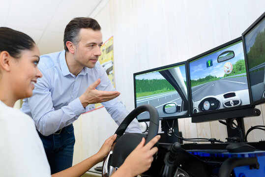 female student trying the drive simulator