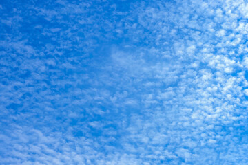 Cirrocumulus, cirrostratus cloud, nature background. Clouds in the blue sky