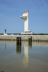 Fototapeta na wymiar Honfleur port entrance and control tower. Honfleur, Normandy, France.