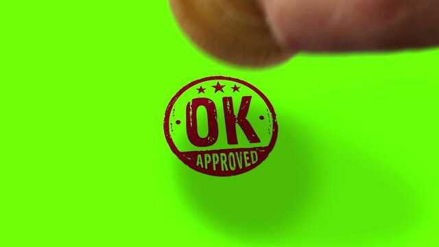 OK approved stamp and hand stamping impact isolated animation. Document accepted, check, admitted and success 3D rendered concept. Alpha matte channel.