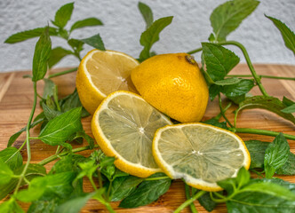 Lemon, sliced with fresh mint.