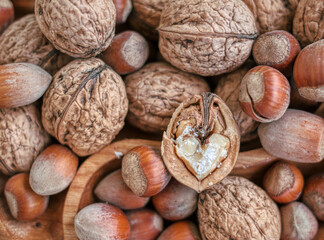 Lots of walnuts stacked side by side.