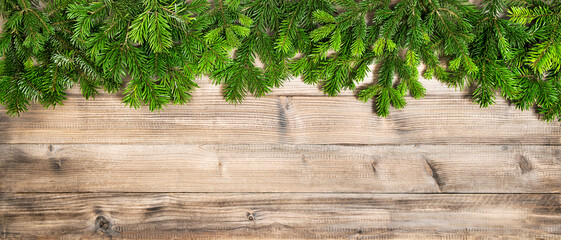 Christmas banner Wooden background pine branches