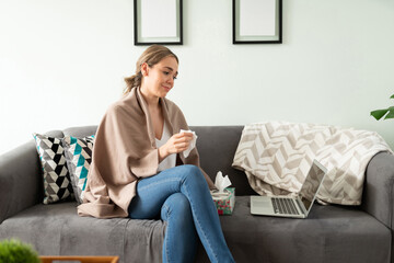 Sick woman seeing doctor in a video call