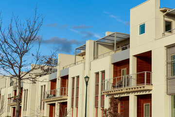 New construction of Row homes with balconies in the Mueller neighborhood of Austin Texas