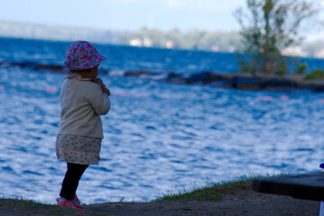 little child playing on the beach