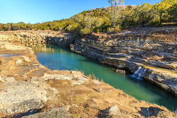 Canyon Lake Gorge formed in 2002 after many inches of rain fell and washed out the land. Just...