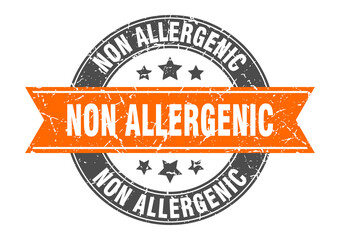 non allergenic round stamp with ribbon. label sign