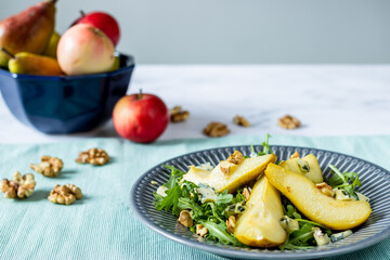 Caramelized pear, roquefort cheese, and walnut salad