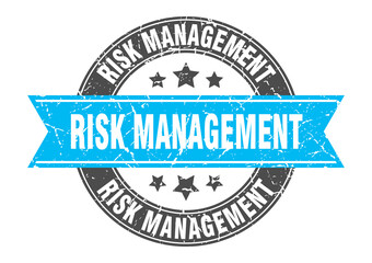 risk management round stamp with ribbon. label sign