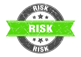 Obraz premium risk round stamp with ribbon. label sign