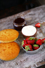 Selective focus. A set of products for making Victoria Sponge Cake. Strawberry pie recipe