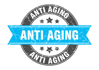 Fototapeta premium anti aging round stamp with ribbon. label sign