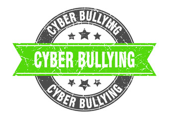 Obraz premium cyber bullying round stamp with ribbon. label sign