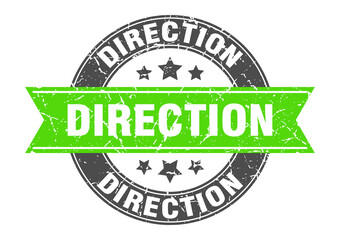 Obraz premium direction round stamp with ribbon. label sign