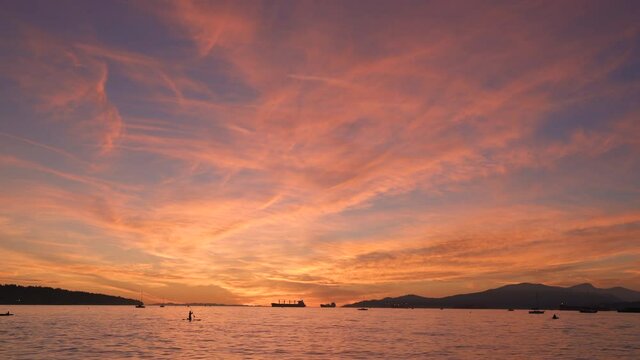 Kitsilano Beach Vancouver Sunset 4K UHD. English Bay and Salish Sea sunset looking towards Vancouver Island. 4K UHD.
