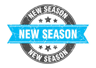 new season round stamp with ribbon. label sign