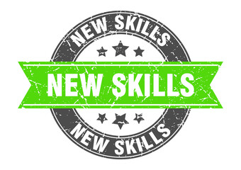 new skills round stamp with ribbon. label sign