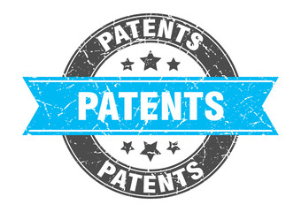 patents round stamp with ribbon. label sign