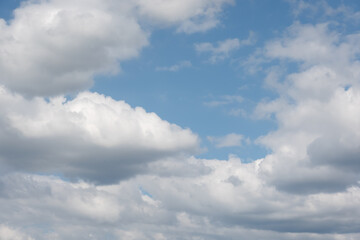 white clouds over blue sky
