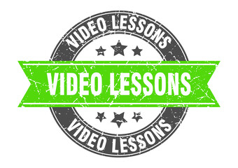 video lessons round stamp with ribbon. label sign