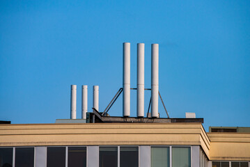 chimneys on the roof of the building