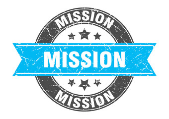 Fototapeta premium mission round stamp with ribbon. label sign