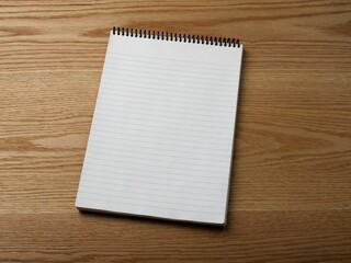 Notebook on wooden background