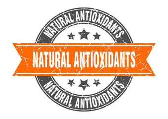 natural antioxidants round stamp with ribbon. label sign