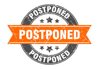 postponed round stamp with ribbon. label sign