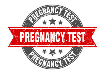 Obraz premium pregnancy test round stamp with ribbon. label sign