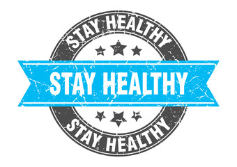 Obraz premium stay healthy round stamp with ribbon. label sign