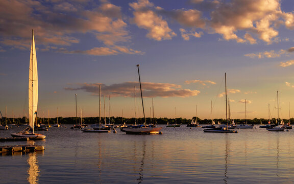 Sailing boats in the lake at sunset