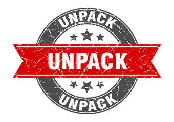 unpack round stamp with ribbon. label sign
