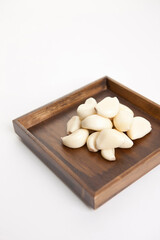 garlic on wooden plate