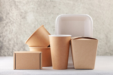 Set of  paper tableware on a gray background.  Mock up