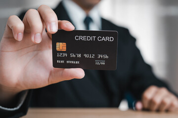 Businessman holding credit card is mean businessman doing business Online shopping payment via Internet Banking, Concept digital internet Links from all over the world Internet payments.