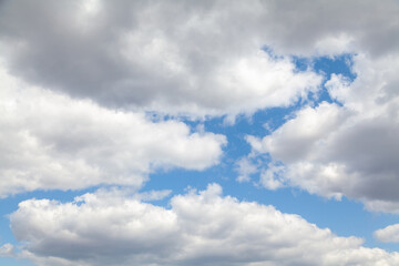 Beautiful white cumulus clouds on blue sky
