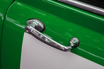 Fototapeta na wymiar 古い車のドアハンドル　Old car door handle (door knob)