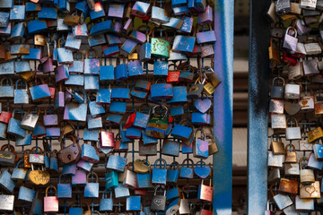 Colorful locks on bridge