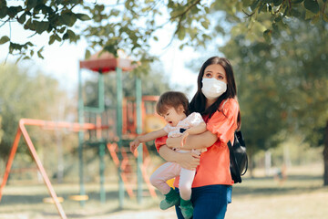 Mother Wearing Face Mask Child Keeping Child Away from Playground
