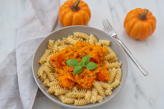 home made autumn pasta with hokkaido pumpkin and red lentils