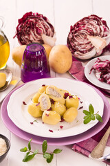 Potato gnocchi stuffed with radicchio and ricotta.