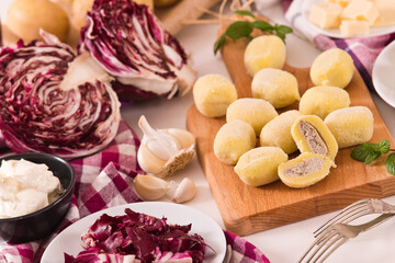 Potato gnocchi stuffed with radicchio and ricotta.