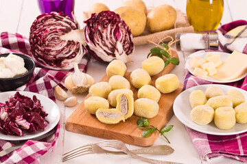 Potato gnocchi stuffed with radicchio and ricotta.