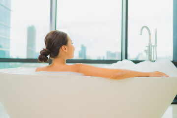 Portrait beautiful young asian woman relax smile leisure in bathtub