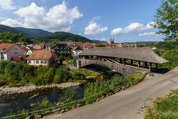 Fototapeta na wymiar The historical old wooden bridge in Forbach, Black Forest, Germany