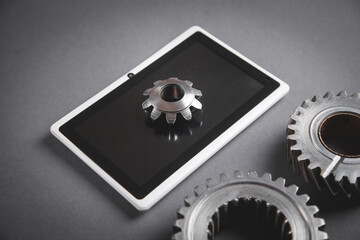 Metal gears mechanism with a digital tablet.